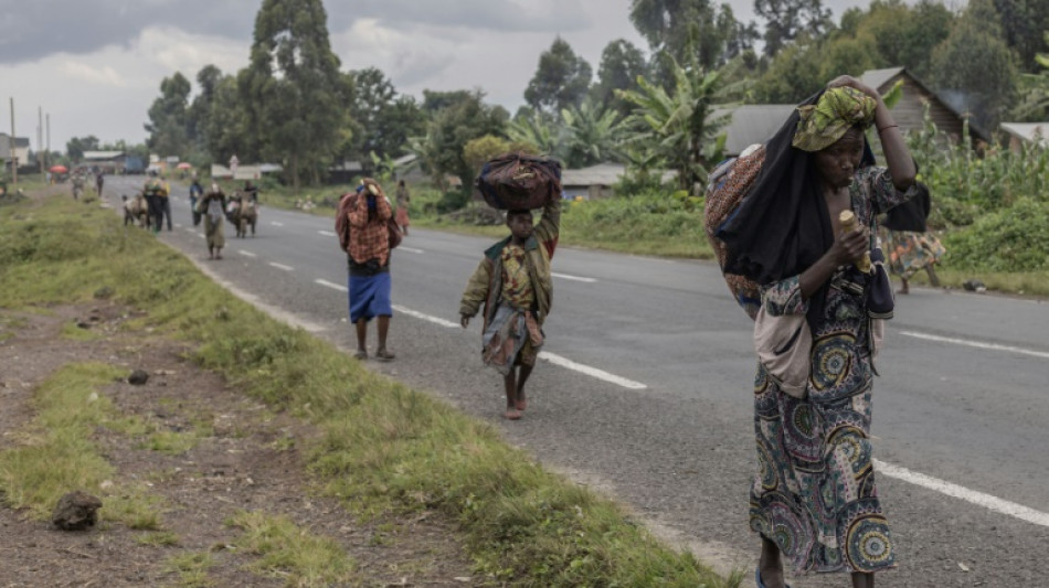 Displaced by rebel clashes, people in east DR Congo make uneasy trek home