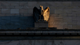 Stock markets diverge before Fed as China woes weigh