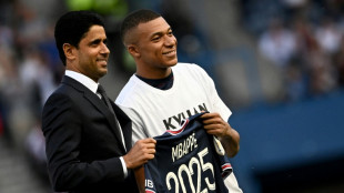 'Very happy' Mbappe snubs Real Madrid to stay at PSG