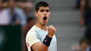 Alcaraz saves match point in French Open survival epic