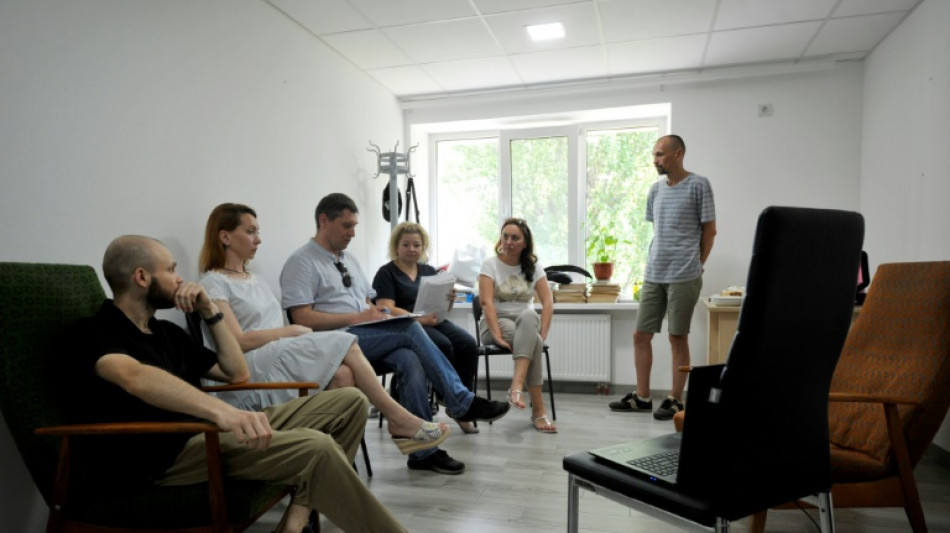 Ukrainians seek to heal war trauma at mental health clinic