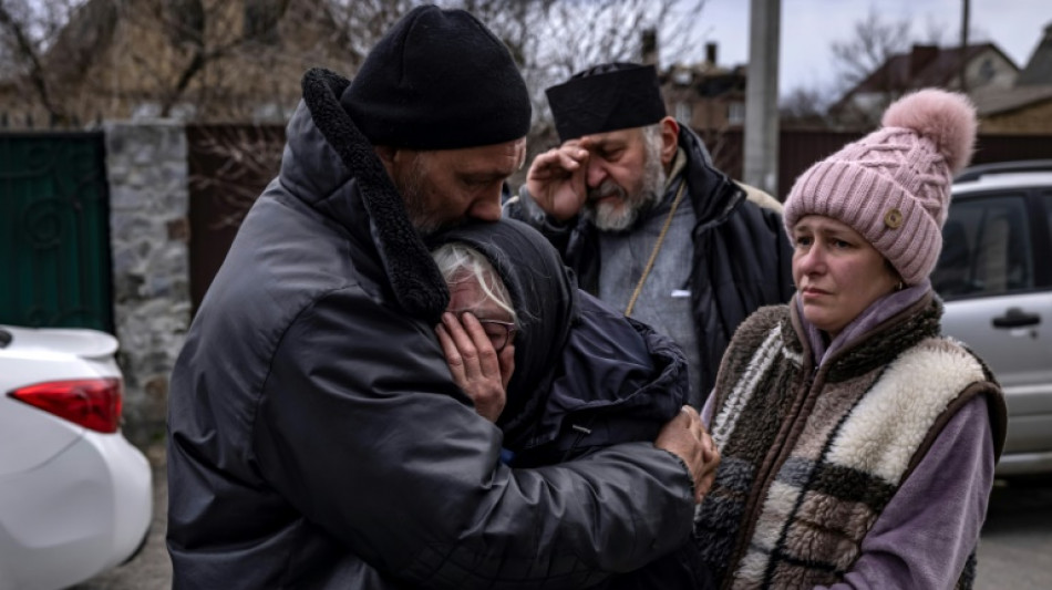 Mayor exhumed as Ukraine confronts grim cost of war