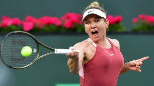 Halep upsets home favourite Badosa to reach Madrid third round