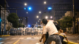 Clashes in Lima as thousands rally against Peru government