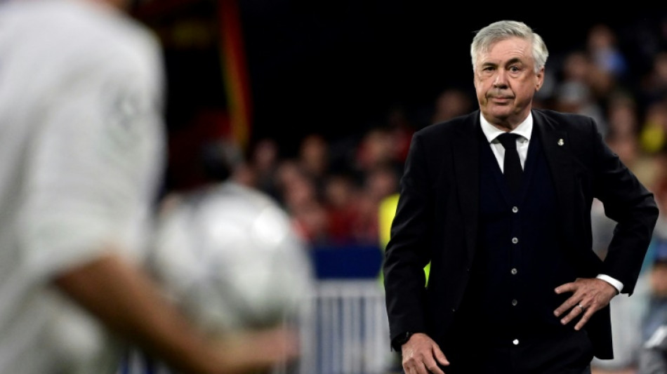 'Record man' Ancelotti puts his landmark down to luck