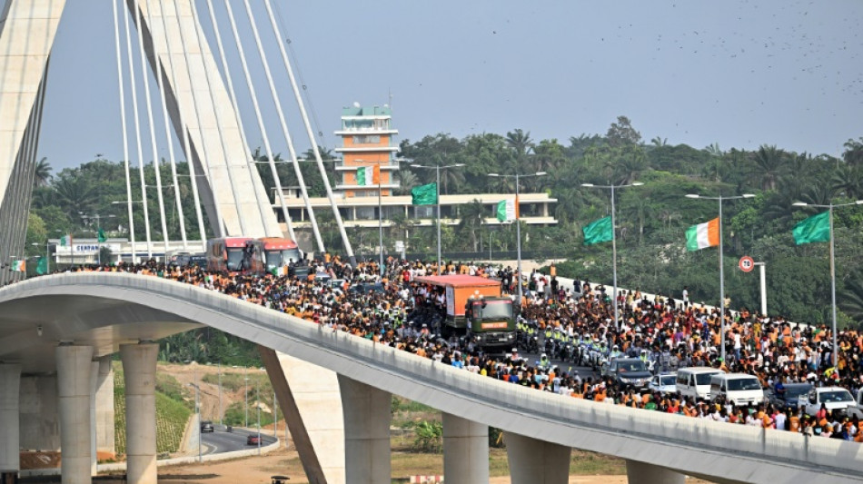 Behind the growth, Ivory Coast's debt fuels debate