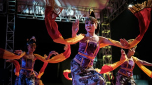 Indonesian dancers keep the beat for ancient drag tradition