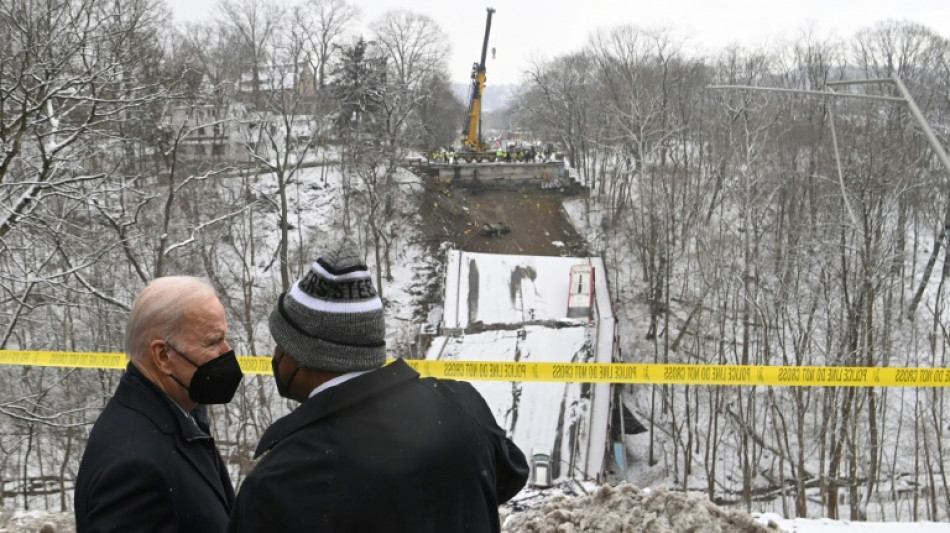 At collapsed bridge, Biden envisions rebuilding America