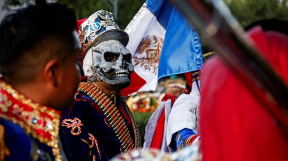 Thousands flock to Day of the Dead parade in Mexico City