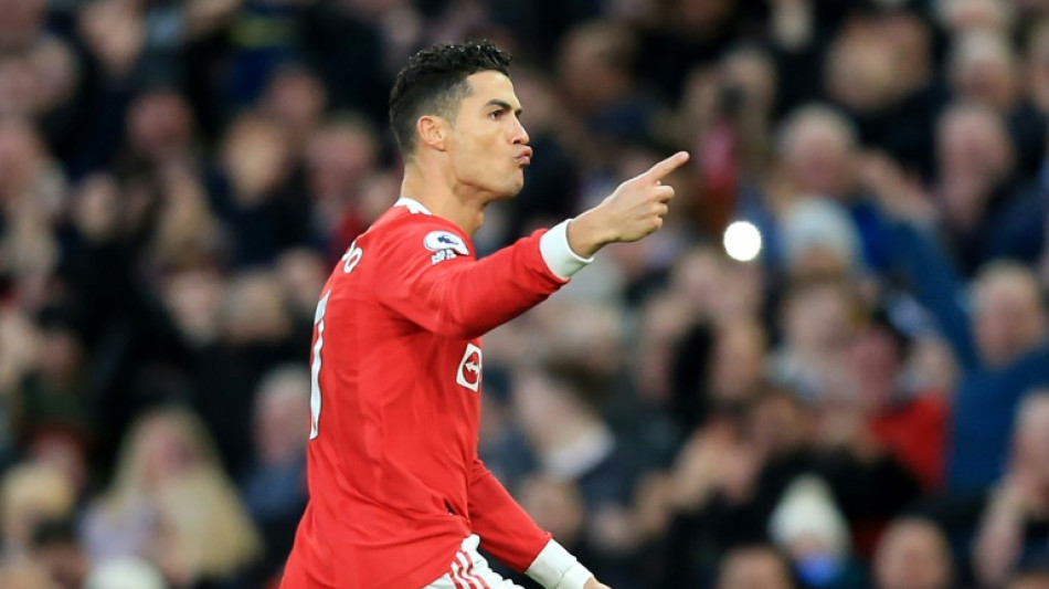 Ronaldo makes history as treble sinks Spurs, Liverpool close gap on Man City