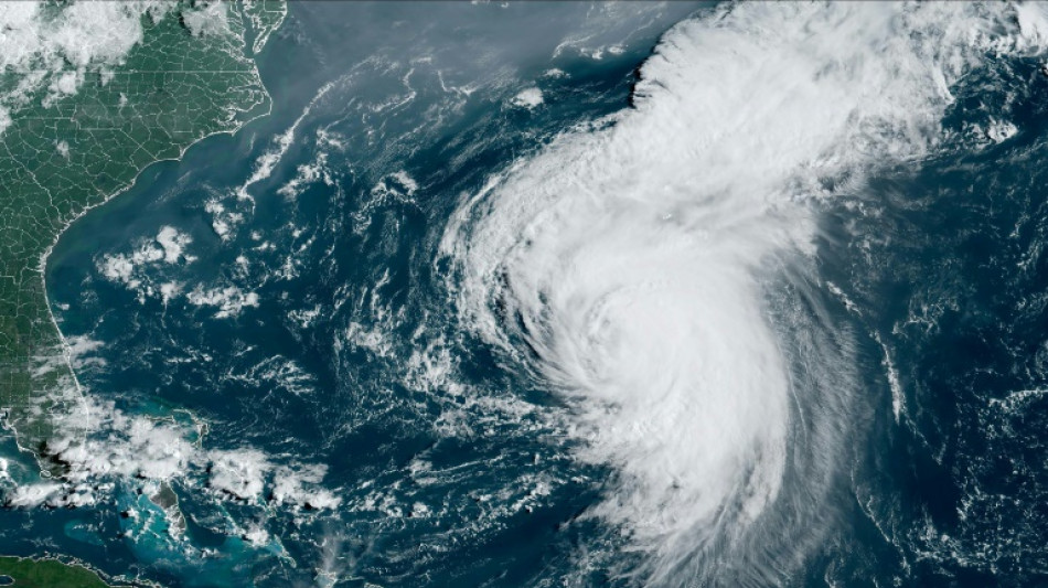 Hurricane Ernesto downgraded to tropical storm as it exits Bermuda