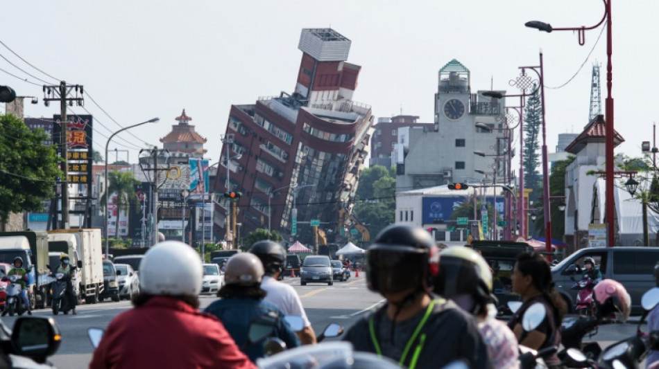 Helicopter plucks miners to safety as Taiwan searches for missing after quake