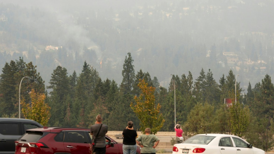 Western Canada wildfires force tens of thousands to flee