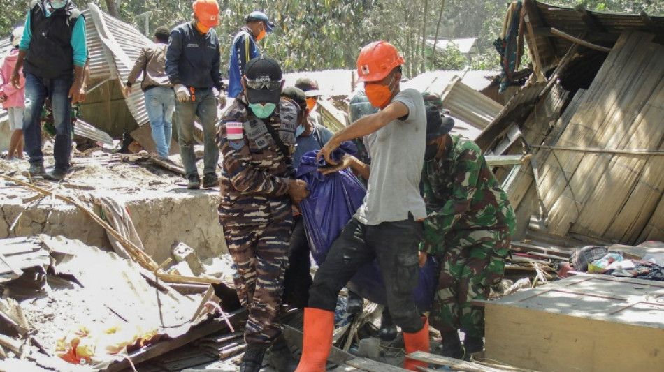 Indonesia volcano eruption kills 10, sets houses aflame