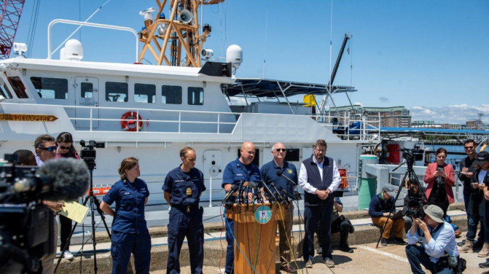 Rescuers embark on all-night race to save Titanic sub crew