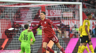 Bayern down Dortmund to win 10th straight Bundesliga title