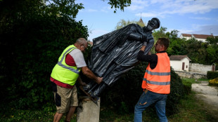 Statue of French charity icon Abbe Pierre removed after abuse claims