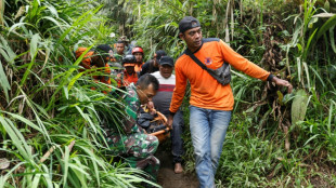 Indonesian rescuers race to find 12 missing after eruption