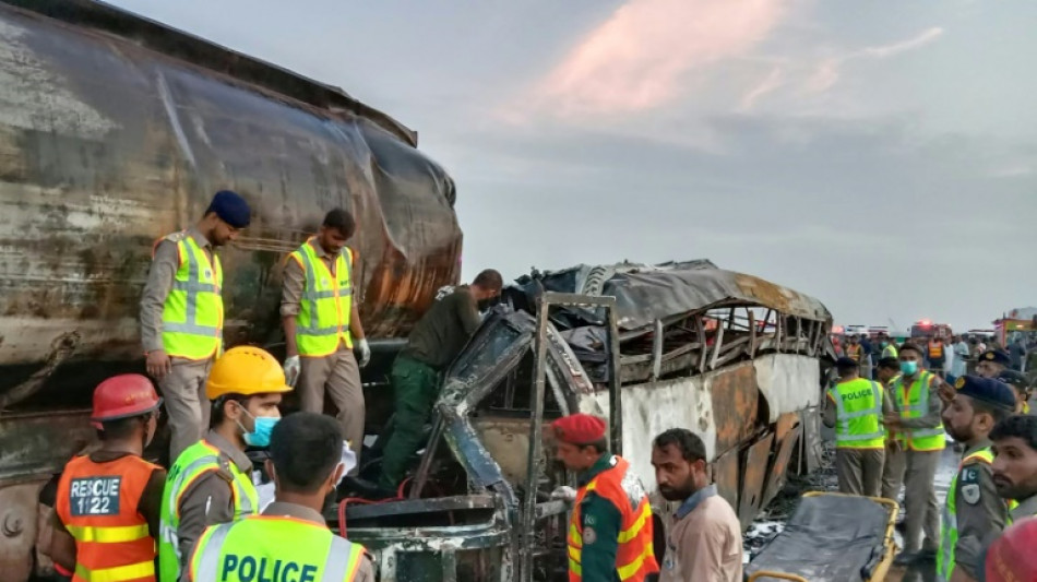 Pakistan road crash inferno kills 20