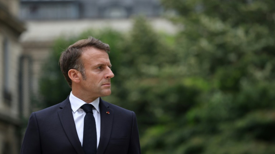 France celebrates national day as political crisis rumbles on