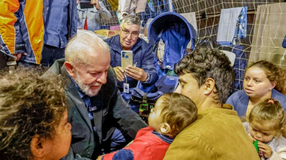 Brazil announces aid to families as Lula visits flooded south