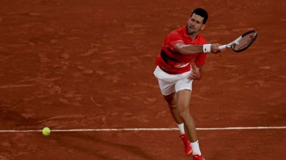 Djokovic wins on Grand Slam return as Nadal strolls at French Open