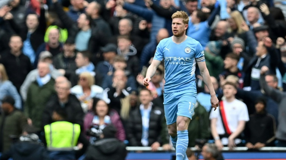 Man City's De Bruyne expects more twists in title race after Liverpool draw