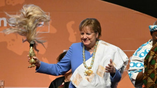 Merkel receives UNESCO peace prize for welcoming refugees