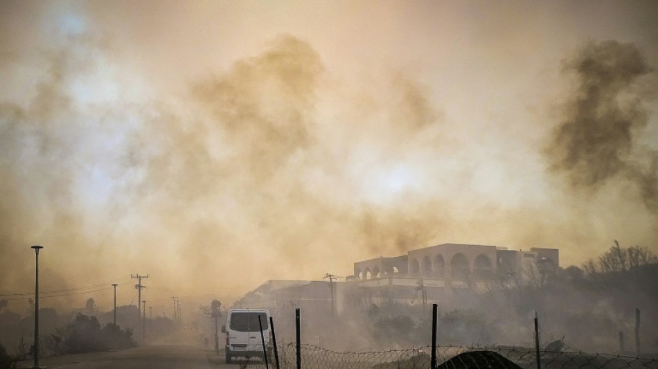 Locals, tourists flee wildfire on Greece's Rhodes island