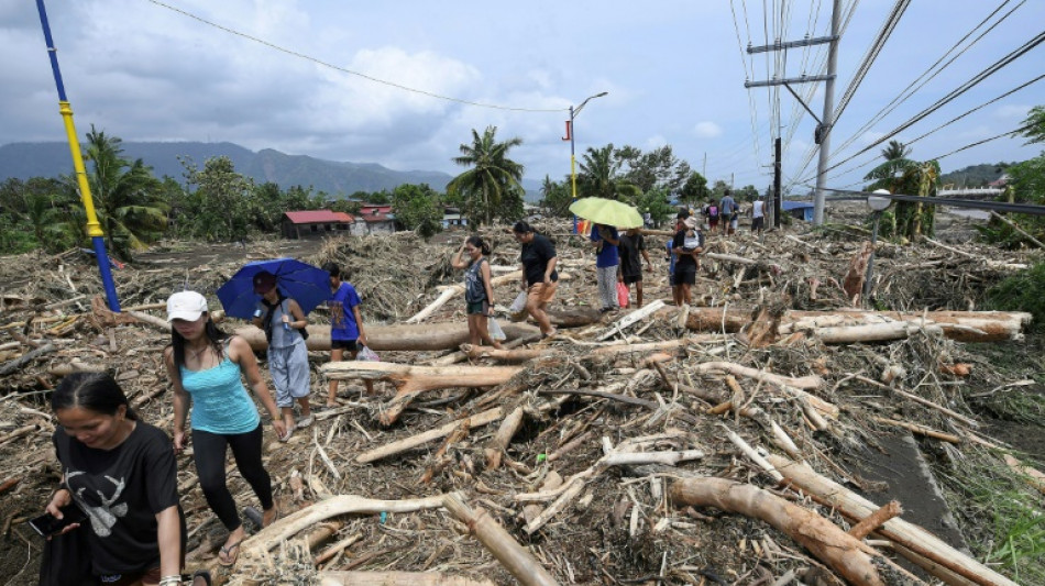 Tropical storm leaves towns submerged, 76 dead in Philippines