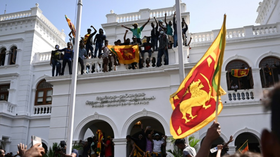 Sri Lankan troops stand by as protestors occupy PM's office