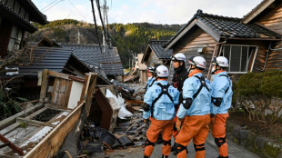 Japan quake toll rises to 62 as weather hampers rescuers