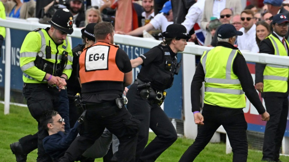 UK police swoop on activists as protester invades Epsom Derby