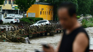 Military helicopters deliver aid to Beijing flood victims