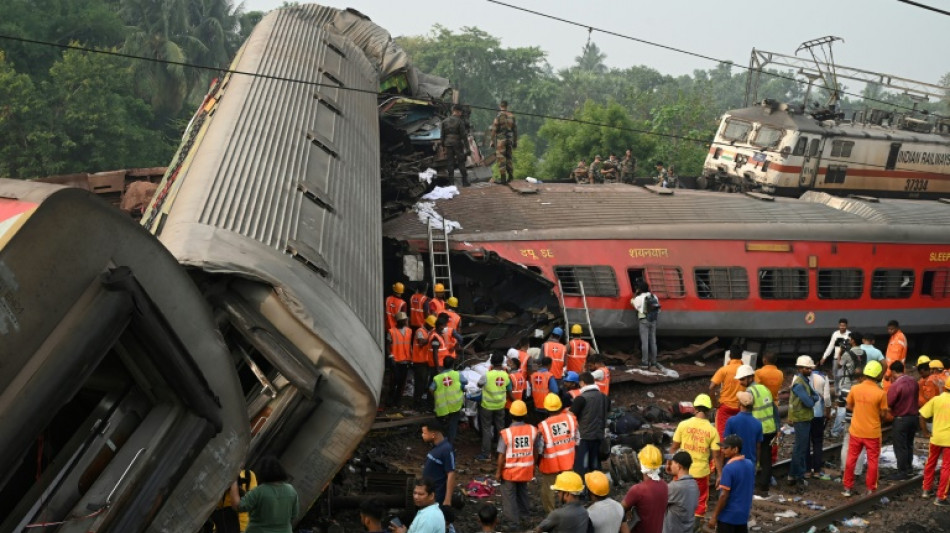 Indian officials search for answers after train crash kills at least 288