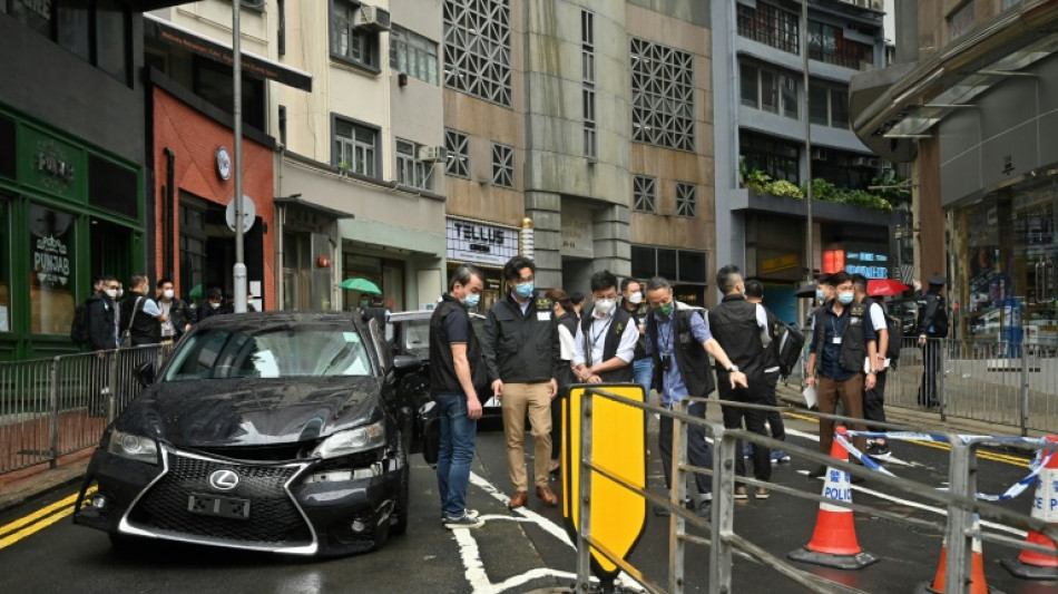 Shots fired, three injured in Hong Kong triad clash